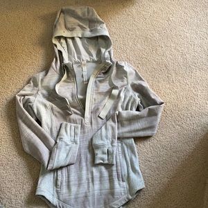 Lululemon pull over with a hood.
